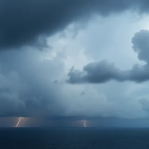 Dark storm clouds gathering over the Caribbean as Tropical Storm Rafael approaches.